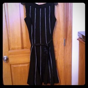 Black dress with white details. Size 12